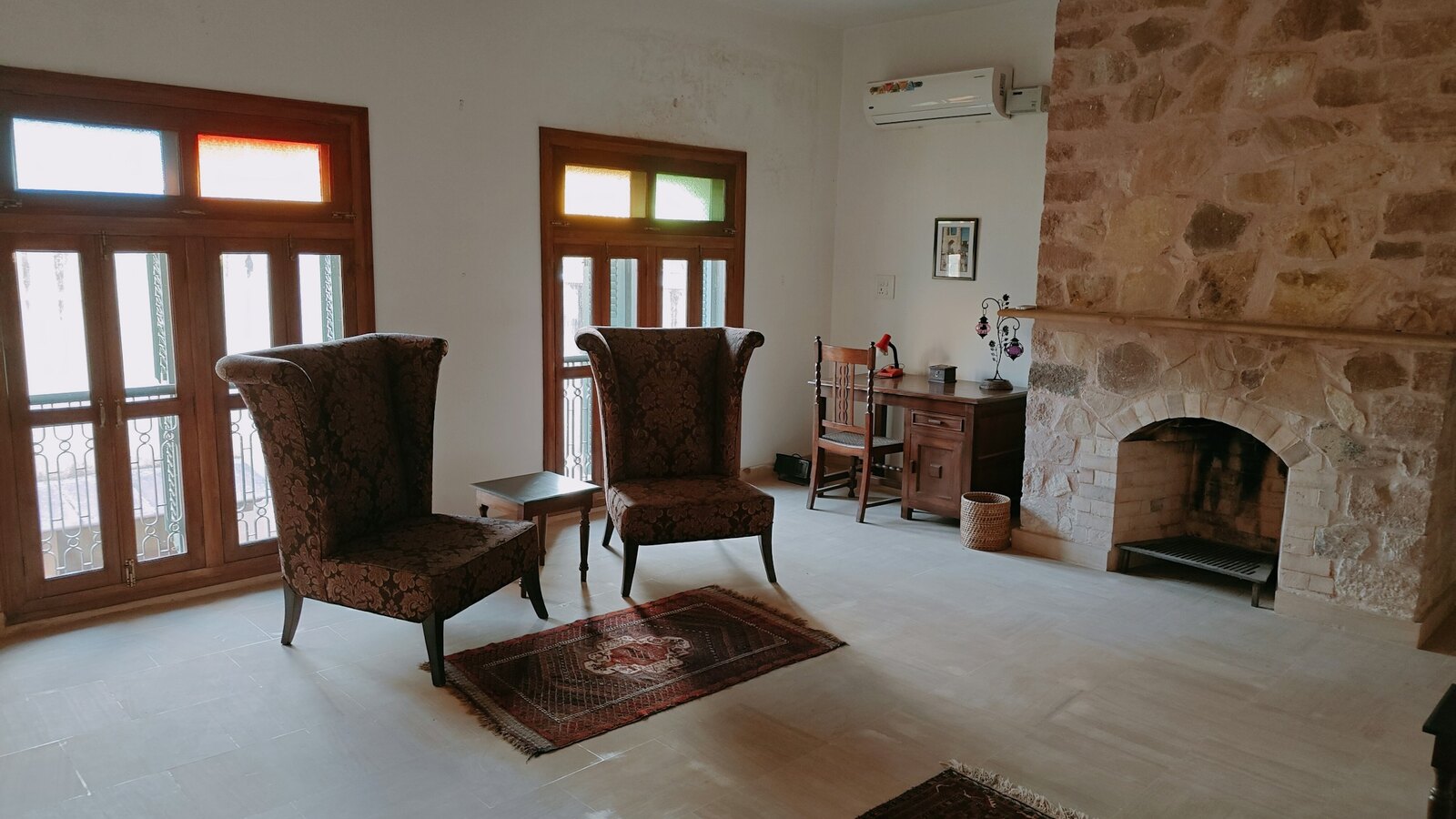 A quiet room with soft daylight and two chairs